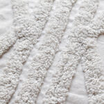 Detalle textura funda con cojín rustic 45 color blanco, textura afelpada y lisa. All Star decoración