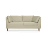 sofá gales tapizado liso en color beige con patas cónicas en madera maciza tono envejecido 100%, visto de frente. Muebles All Star