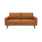 Sofá Río tapizado liso en color terracota con patas en madera maciza envejecidas al 100% torneadas visto desde frente. Muebles All Star