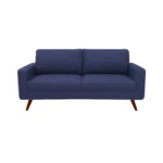 Sofá Río tapizado liso en color azul con patas en madera maciza envejecidas al 100% torneadas visto desde frente. Muebles All Star