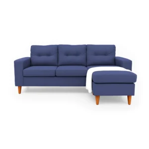 Sala en L Cielo con puff intercambiable tapizada en color azul, capitoneado en espaldar, con manta decorativa color blanca y patas en madera tono envejecido al 50% torneadas vista de frente. Muebles All Star